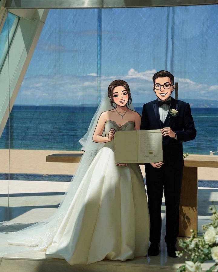 Bride and groom holding their marriage certificate in the Conrad Bali Infinity Chapel